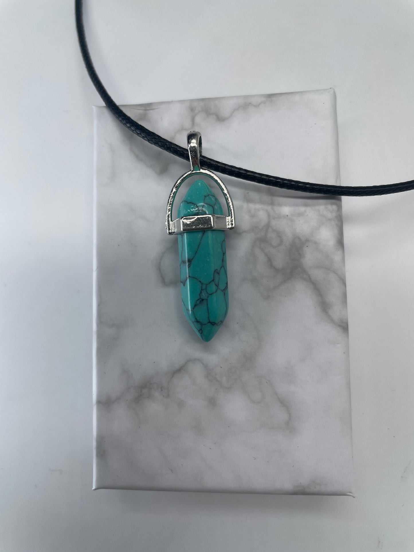 Pendente azzurrino con venature