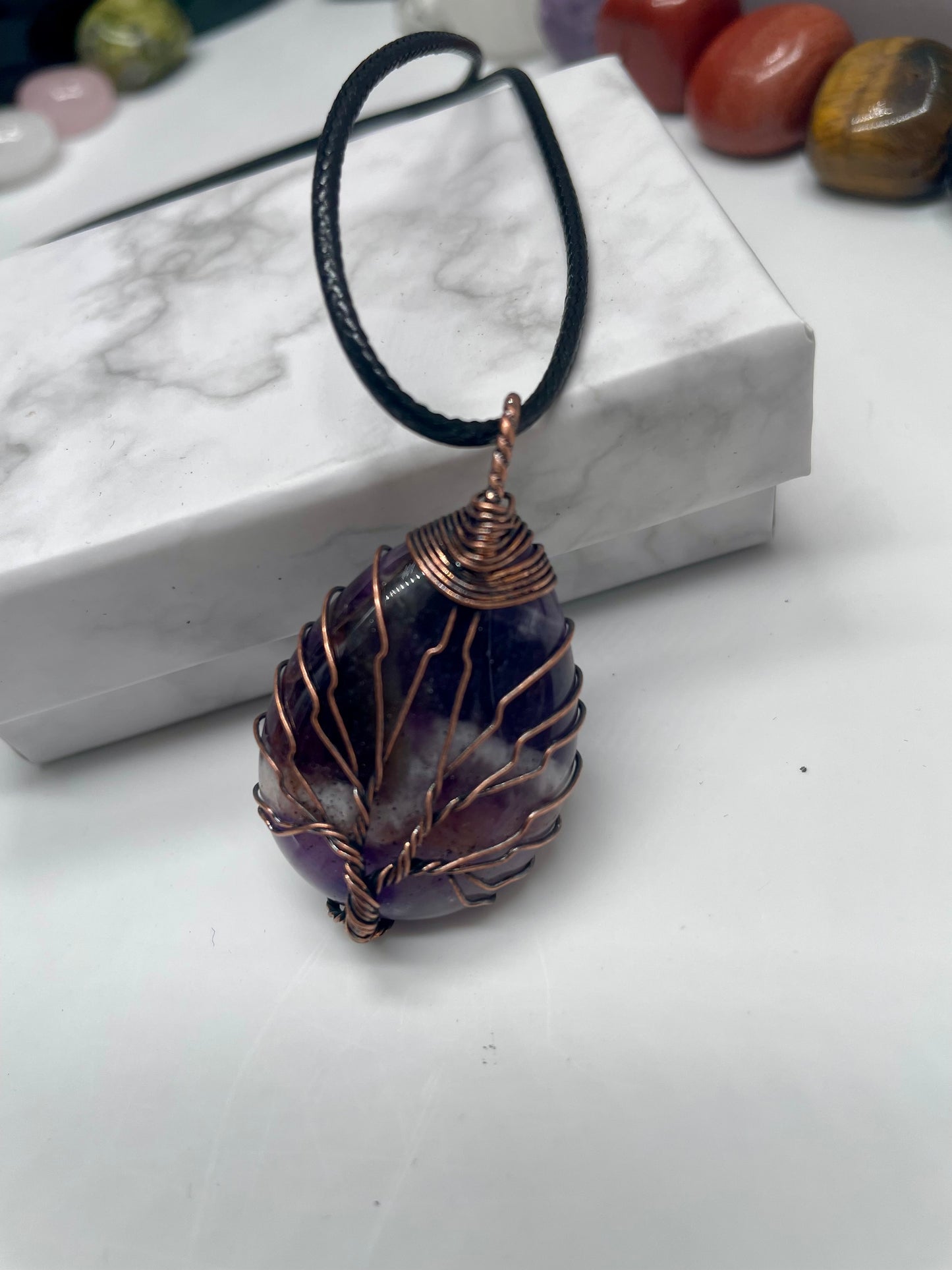 Pendente in ametista con venature in rame