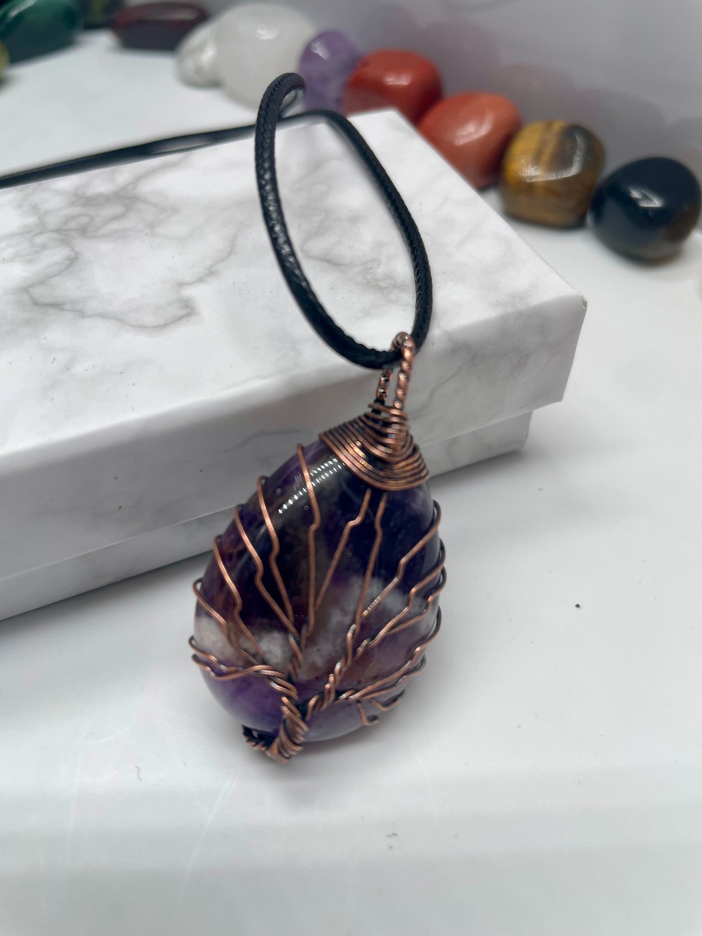 Pendente in ametista con venature in rame