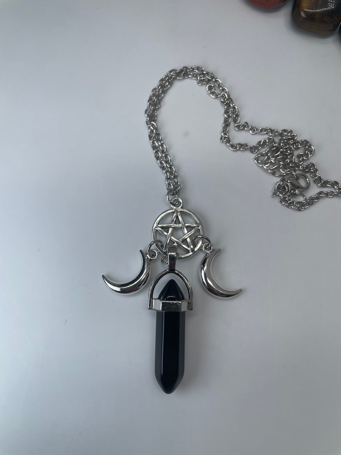 Pendente con pentacolo e lune crescenti