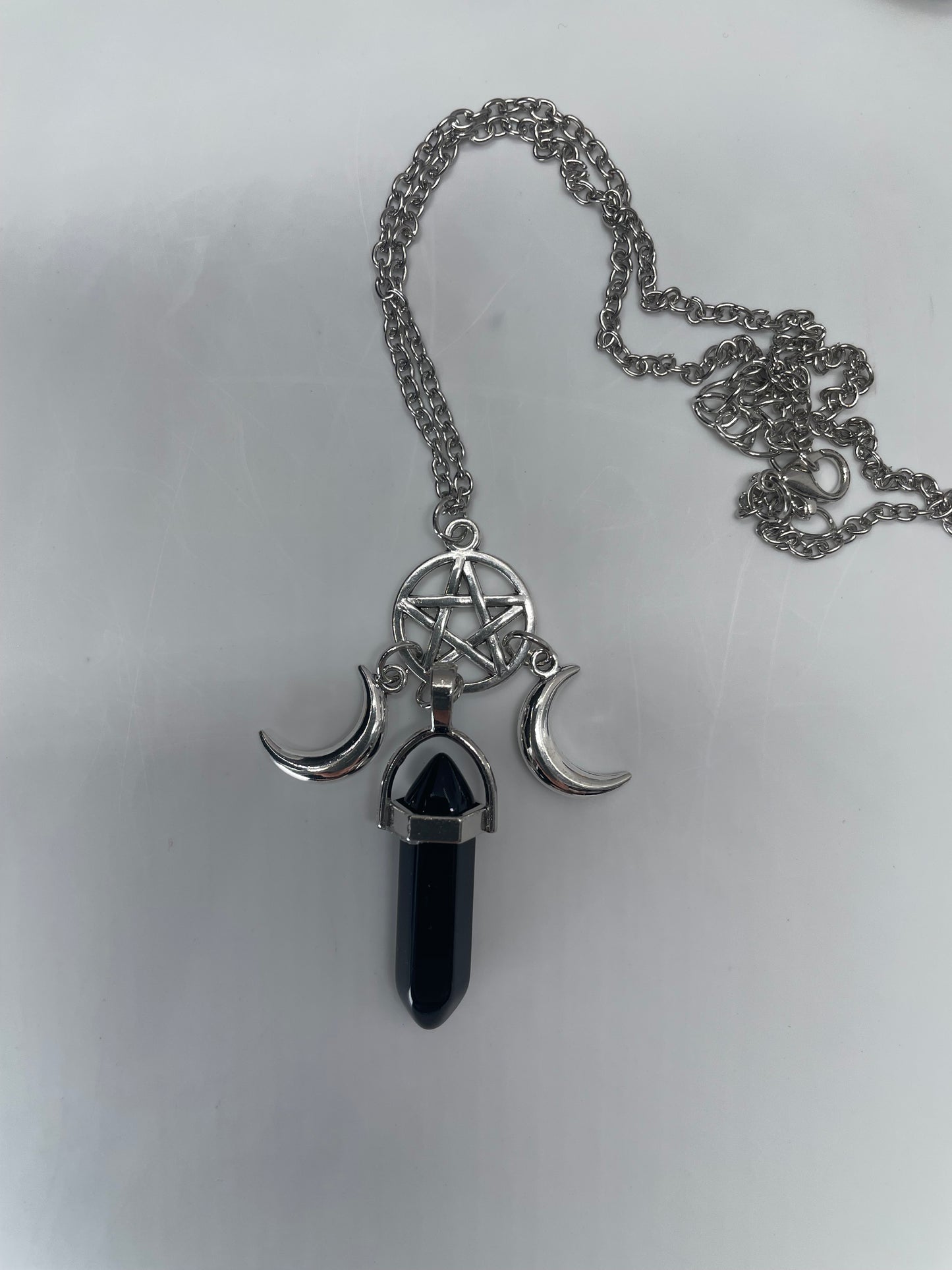 Pendente con pentacolo e lune crescenti