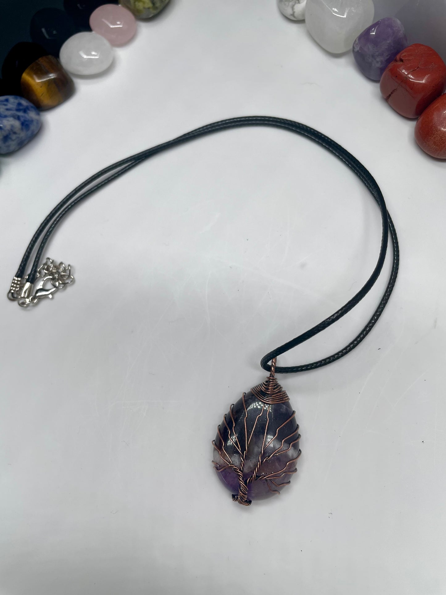Pendente in ametista con venature in rame