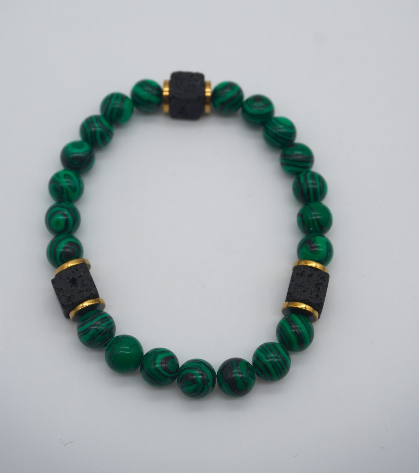 Bracciale in Malachite con Pietre Laviche – Potere, Eleganza, Energia