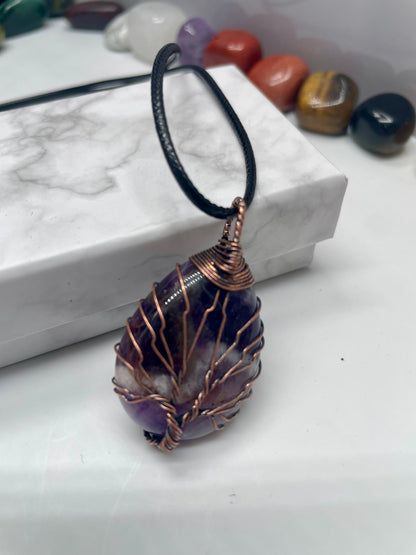 Pendente in ametista con venature in rame