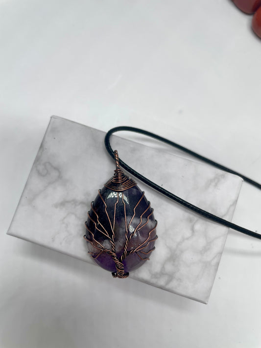 Pendente in ametista con venature in rame