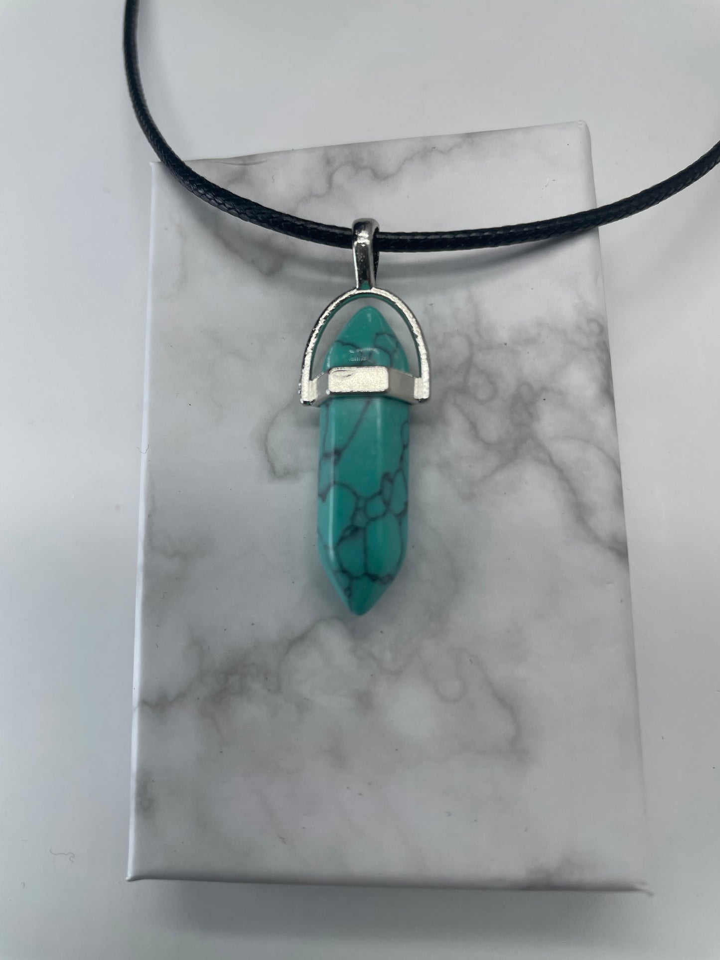 Pendente azzurrino con venature